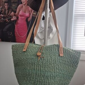 Elegant Green Woven Tote with Tan Straps